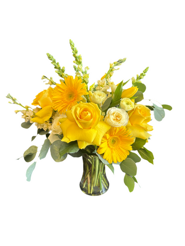 Yellow roses, gerberas, tulips, a ray of sunshine to makes anyone smile here in Houston.
