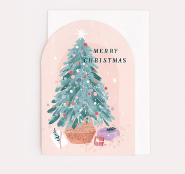 This Christmas card showcases a snug illustration of a Christmas tree decorated with colorful baubles and gifts tucked neatly beneath. Set against a soft pastel background, the cheerful ‘Merry Christmas’ message pops in a hand-lettered font. Add to your holiday flower order for pick up or delivery in Houston